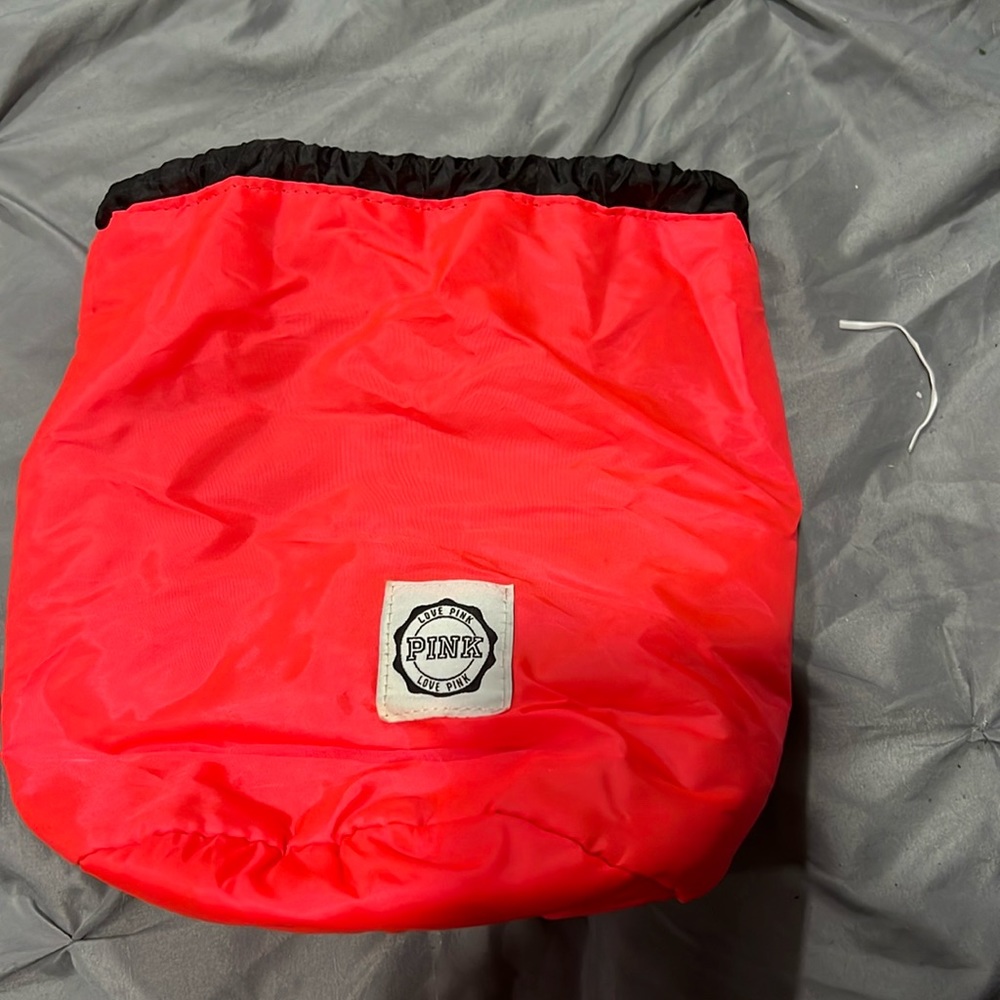Neon pink cosmetic bag